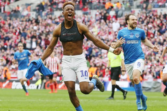 Jamal Lowe celebrates scoring in the Checkatrade Trophy final - one of 17 goals he bagged in 2018-19 for Pompey. Picture: Joe Pepler