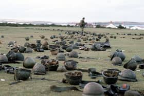 Steel helmets abandoned by Argentine armed forces who surrendered at Goose Green to British Falklands Task Force troops Picture: PA Wire
