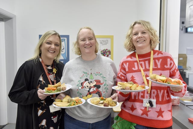 Beacon View Primary Academy in Paulsgrove held their annual community Christmas lunch on Friday, December 22.

Pictured is: (l-r) Emma Hogan and Siobhan Campbell, phase leaders with Rosie Higson, vice principal of Beacon View Primary Academy.

Picture: Sarah Standing (221223-4076)