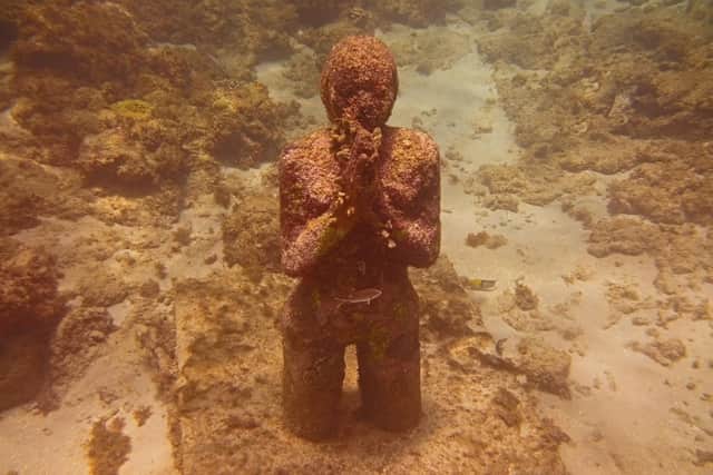 Girl Praying statue at Molinere Underwater Sculpture Park