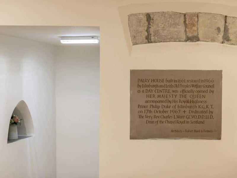 Plaque detailing history of the building.