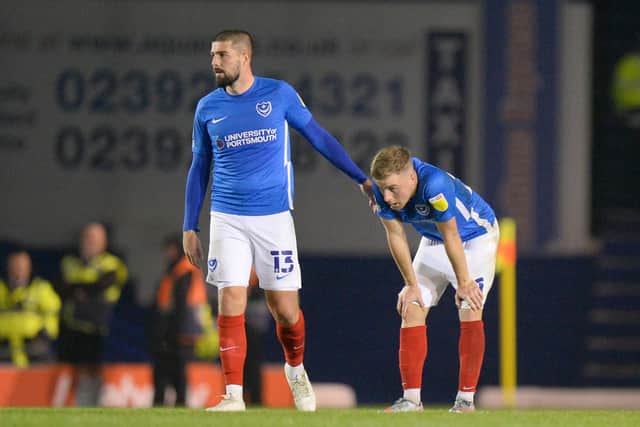 Joe Morrell with Kieron Freeman after tonight's defeat to Ipswich Picture: Graham Hunt/ProSportsImages