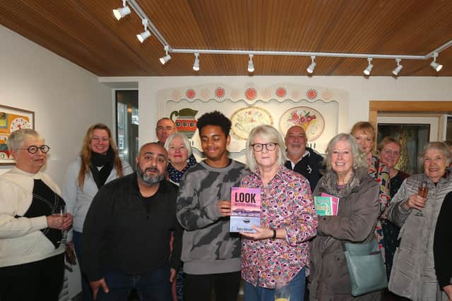 Fiona Ballard, centre, with family and well-wishers at her book launch for Look Both Ways at the Jack House Gallery, High Street, Portsmouth
Picture: Chris Moorhouse (jpns 070123-109)