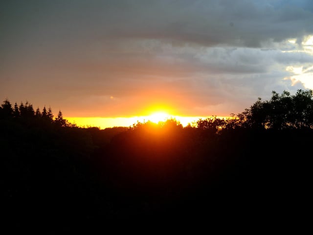 Wickham Festival 2023 in Blind Lane, Wickham. Day 4 of the festival took place on Sunday, August 6.Pictured is: A beautiful sunset over Wickham as the festival draws to a close.Picture: Sarah Standing (060823-1031)