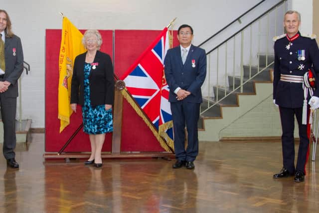From left, Mark Thompson-Smith BEM, Sandra Berriman BEM and Sokphal Din BEM