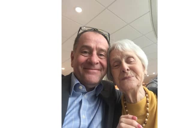 Michael J. Thornton with his mother Monica.