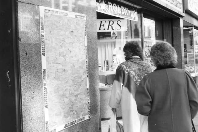 Shoppers heading into jeweller Dimmers in Osborne Road, Southsea, November 1989.