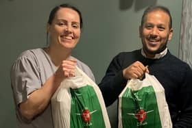 Nurse Vicky Nightingale with Faz Ahmed from The Akash delivering free curries to QA nurses. Picture: Faz Ahmed