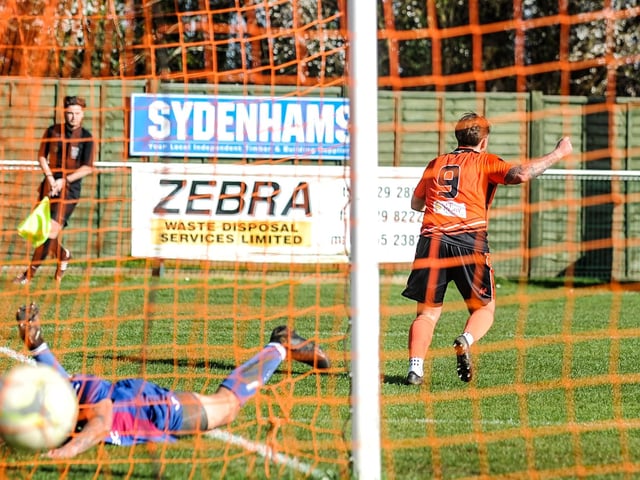 Charlie Bell has just scored Portchester's early winner. Picture by Daniel Haswell
