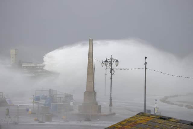 Storm Eunice swept in across Portsmouth on Friday morning, bringing with it a red weather warning and strong winds. Southsea Seafront saw large waves crashing against the sea walls. Photos by Alex Shute