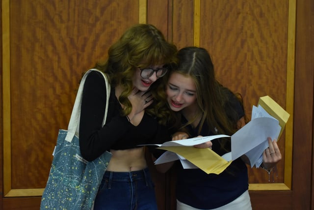 Phoebe Evans and Molly Tuck at Bay House collecting their GCSE results