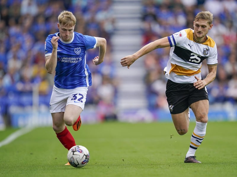 Paddy Lane takes on Port Vale's Nathan Smith down Pompey's right. Picture: Jason Brown/ProSportsImages