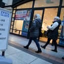 An NHS walk in vaccination sign at Gunwharf Quays. Picture: Finnbarr Webster/Getty Images