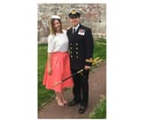 Lieutenant Commander Nathan Geddes is among those named on the Queen's Birthday Honours list for his time serving on HMS Defender, including during the Carrier Strike Group deployment. He is pictured with his wife, Nicole.