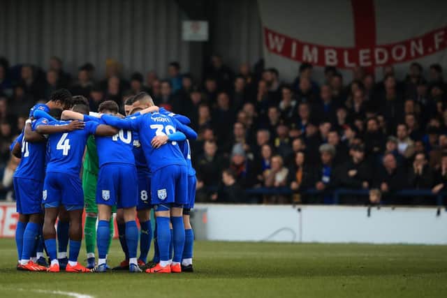 Wimbledon win: 19.3%. Draw: 19%. Posh win: 61.7%