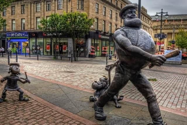 Desperate Dan and Minnie the Minx in Dundee city centre.