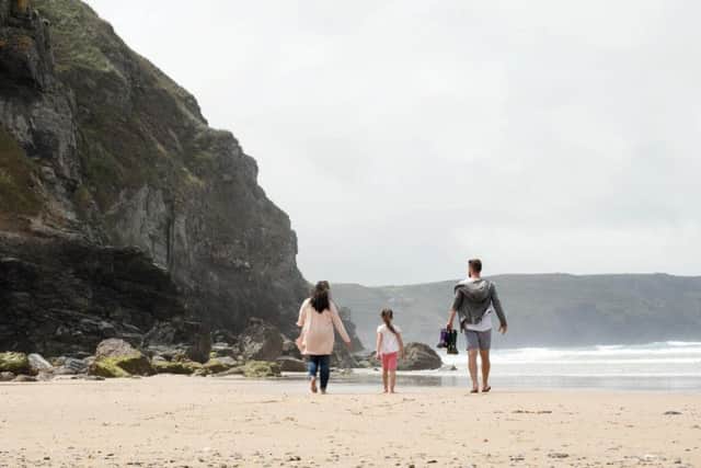 Strolling across the beach to Perranporth.