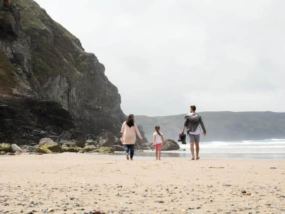 Strolling across the beach to Perranporth.