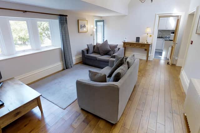 The spacious living room area.