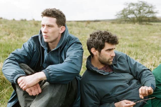 Josh OConnor as Johnny Saxby and Alec Secareanu as Gheorghe Ionescu.