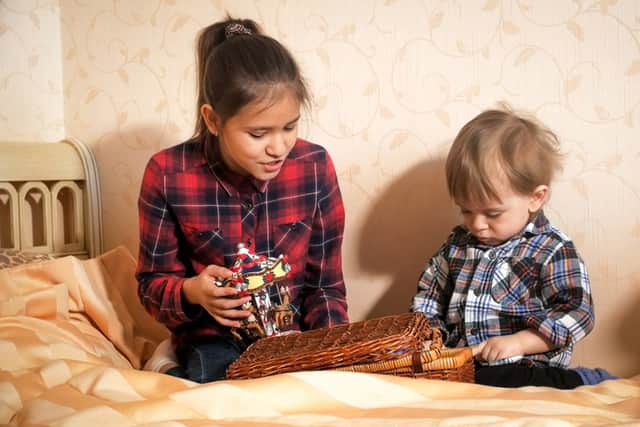Parents differ on how old children can be before they are able to babysit younger siblings (Photo: Shutterstock)