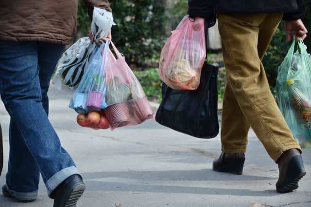 The 5p charge for single-use plastic shopping bags was introduced in England in 2015.
(Shutterstock)