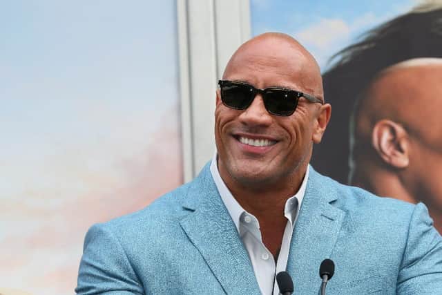 The Rock urged his followers to wear a mask saying "it is the right thing to do." (Getty)