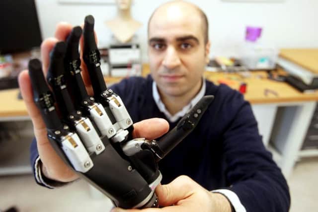 Dr. Kianoush Nazarpour from Newcastle University's Biomedical Engineering department with a new bionic hand