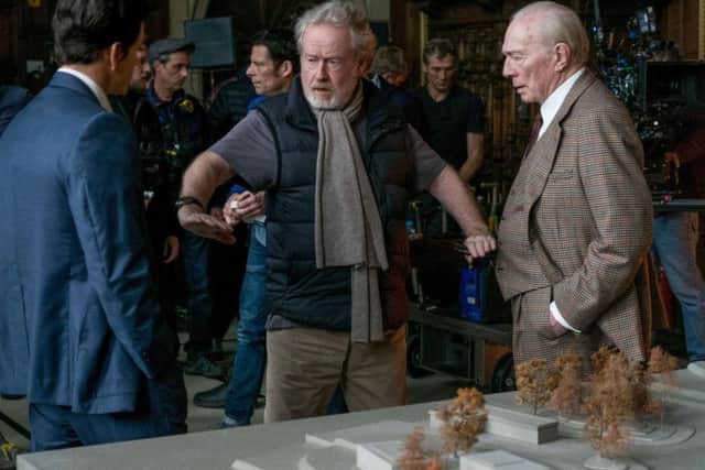Sir Ridley Scott on set with Mark Wahlberg and Christopher Plummer.