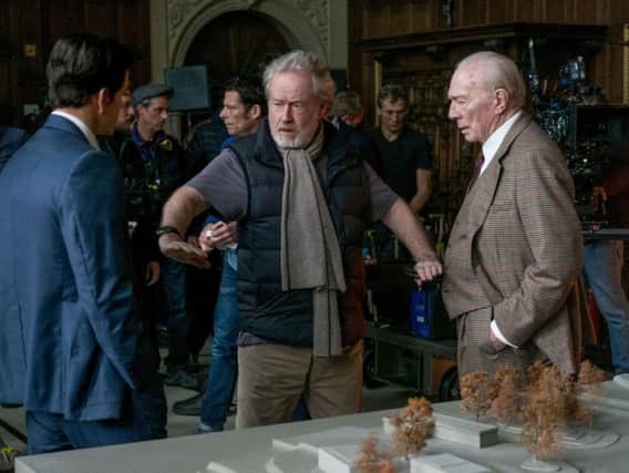 Sir Ridley Scott on set with Mark Wahlberg and Christopher Plummer.