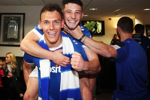 Kal Naismith and Conor Chaplin celebrate Pompey's League Two promotion at Notts County. Picture: Joe Pepler
