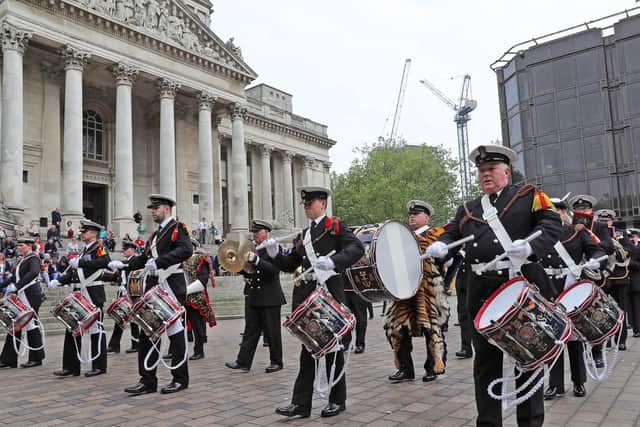 Members of the Royal Navy Volunteer Bands marching through Guildhall in Portsmouth. Photo: Royal Navy