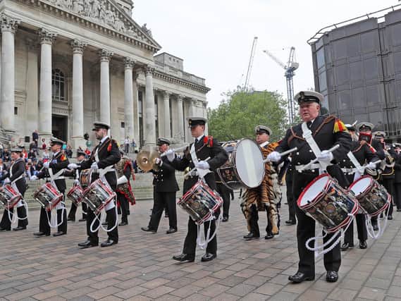 Members of the Royal Navy Volunteer Bands marching through Guildhall in Portsmouth. Photo: Royal Navy