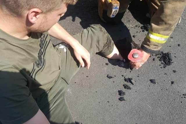 Firefighters had to rescue a man who got stuck in tarmac. Picture: Tyne and Wear Fire and Rescue service/ Twitter
