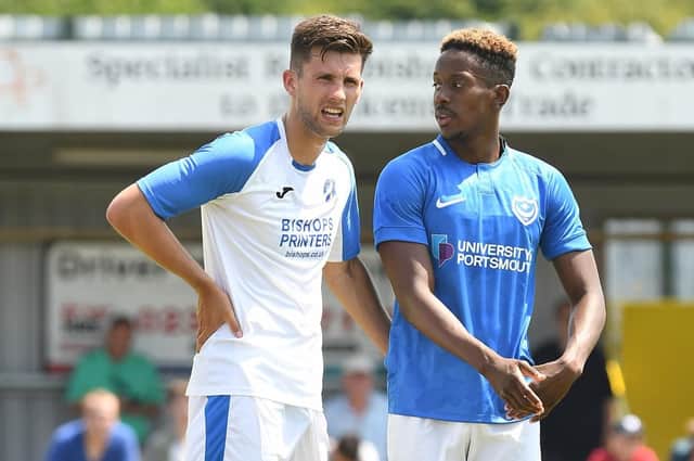 Pompey winger Jamal Lowe, right Picture: Neil Marshall