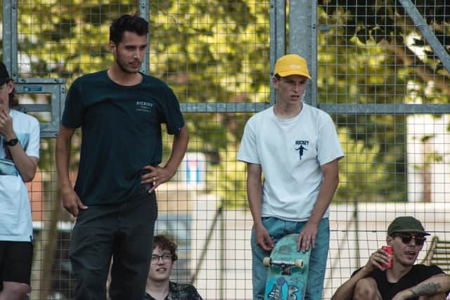 Tom Knox watches the local talent on-show at his post-meet and greet skate jam in Milton on Saturday. Picture: Jake Dicks
