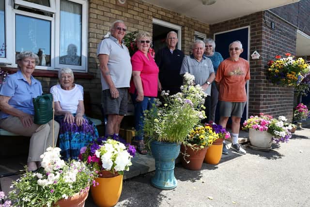 Residents, from left, Barbara Carter, Bess Sait, Bryan and Mary Saunders, Tony Desmond, Ken Sait, and Sheila and Maurice White Picture: Chris Moorhouse