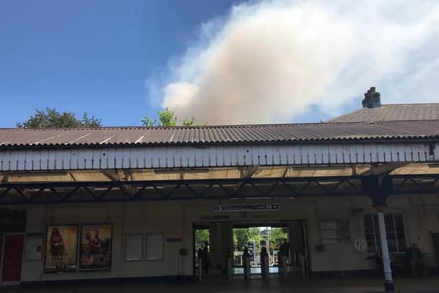 Smoke from Winchester field fire can be seen over the station. Picture: Kat Jennings/ Twitter