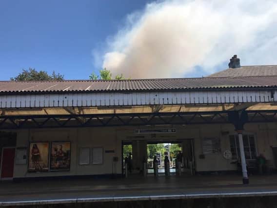 Smoke from Winchester field fire can be seen over the station. Picture: Kat Jennings/ Twitter
