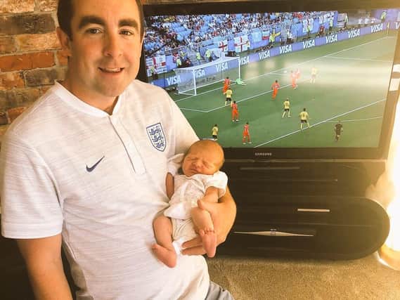 David Claridge and son Albie cheer on England against Sweden