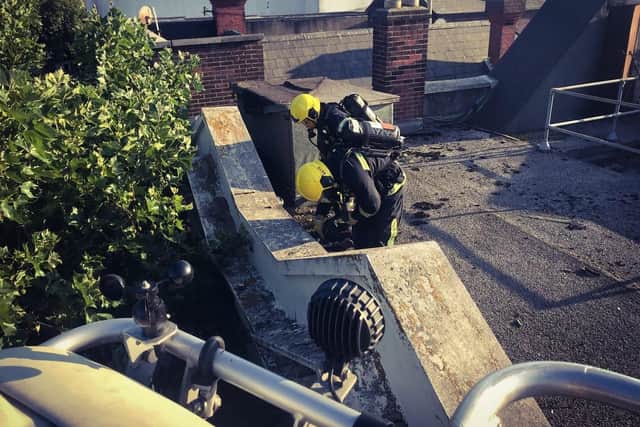 Firefighters on top of the unit in Commercial Road, as they fought the blaze. Credit: Southsea Fire Station