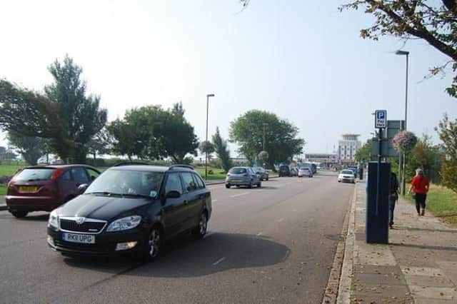 A row of parking spaces and a pay and display machine along Pier Road, Portsmouth. Credit: Geograph (labelled for reuse)