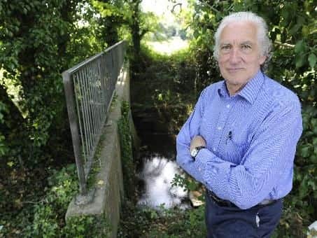 Raymond Bastin has been trying to get the fence on Purbrook Heath Road fixed for over two years. Picture: Ian Hargreaves