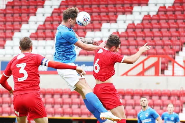 Oli Hawkins was on target with a header at Swindon. Picture: Joe Pepler