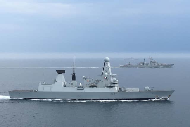HMS Diamond shadows the Russian destroyer Severomorsk and cruiser Marshal Ustinov as they passed through the UKs area of interest on August 7. Picture: Royal Navy