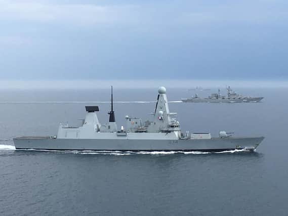 HMS Diamond shadows the Russian destroyer Severomorsk and cruiser Marshal Ustinov as they passed through the UKs area of interest on August 7. Picture: Royal Navy