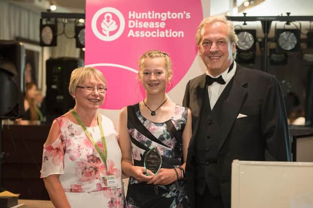 Jess Webb, centre, with HDA chief executive Cath Stanley and charity ambassador Charles Sabine. Picture: Stackphotography