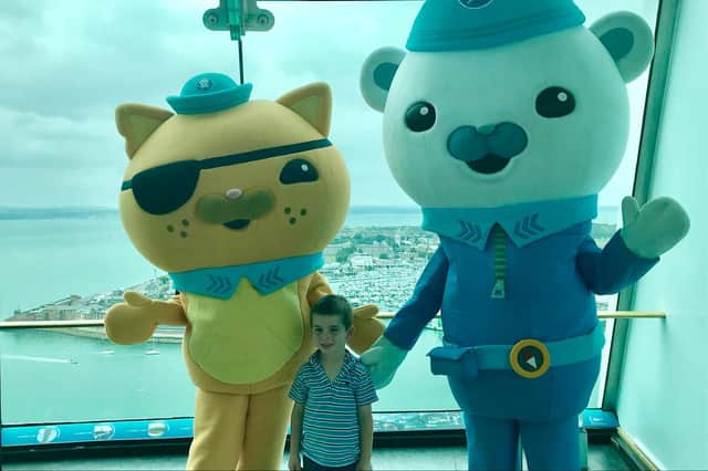 Jake Baldwin, four, with Kwazii the Kitten and Captain Barnacles from the Cbeebies show Octonauts, at the Spinnaker Tower