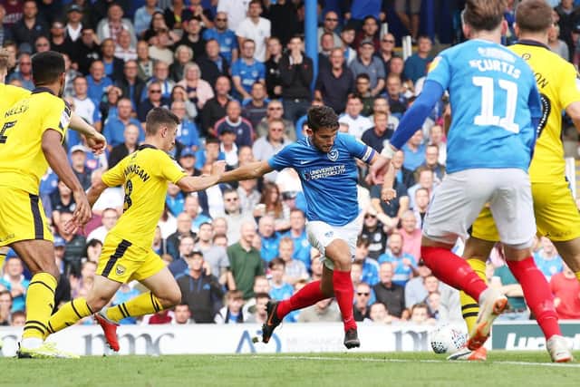 Gareth Evans opens the scoring for Pompey against Oxford United. Picture: Joe Pepler