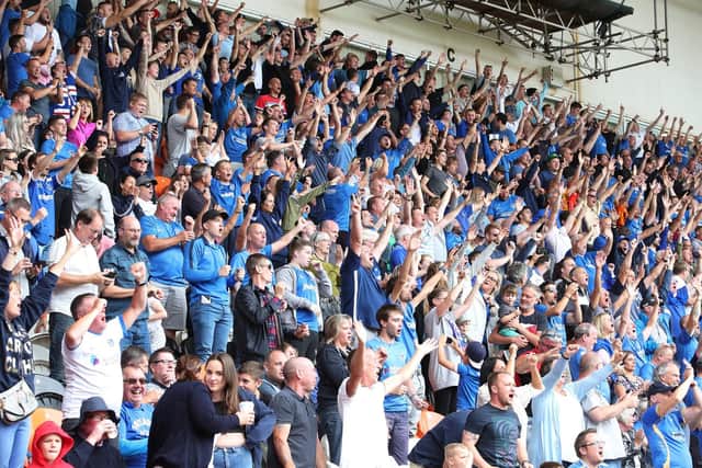 Travelling members of the Fratton faithful during Pompey's 2-1 win at Blackpool earlier this month. Picture: Joe Pepler